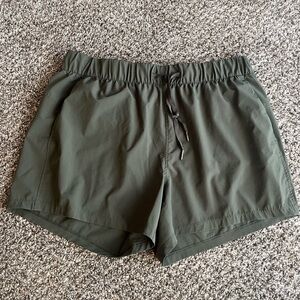 Green athletic shorts